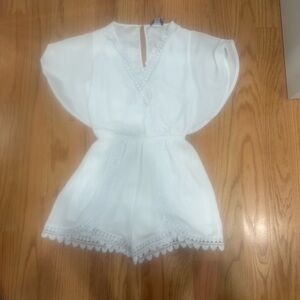 bebe White Lace-Trim V-Neck romper